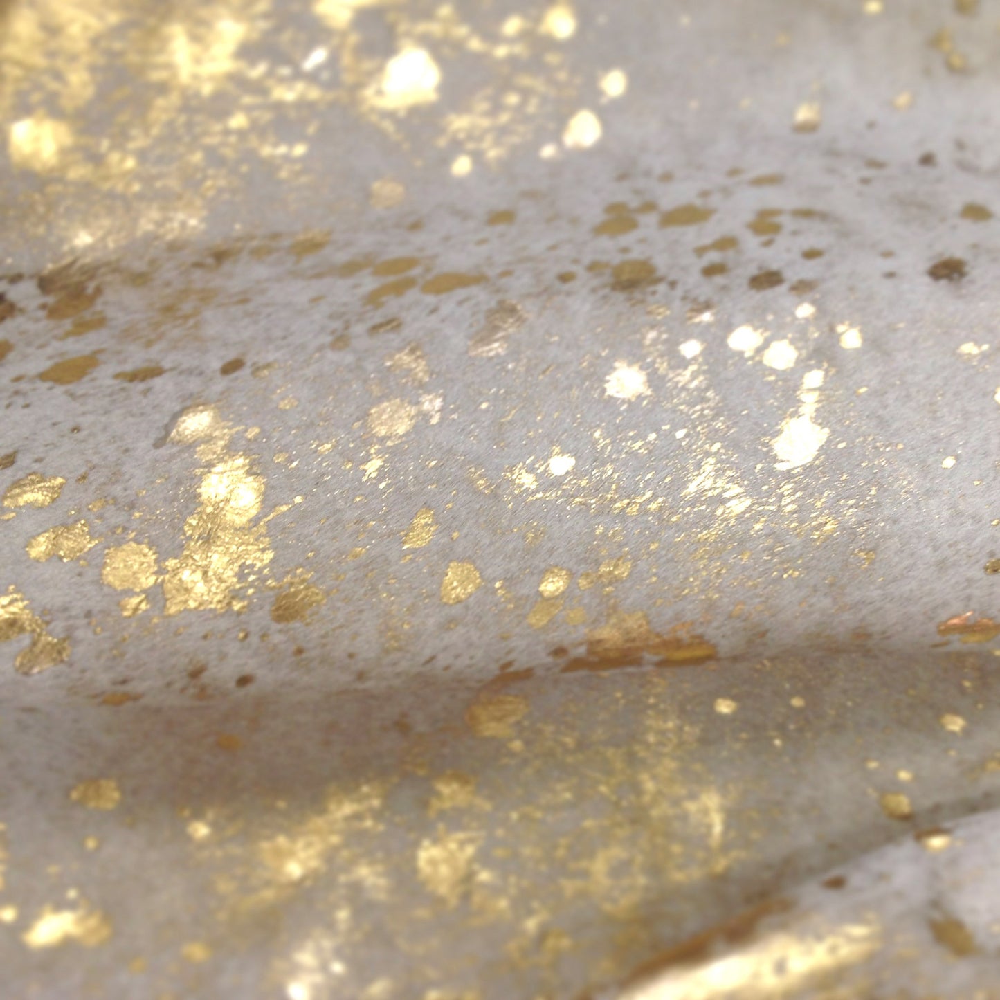 Metallic Gold on Off White Cowhide Rug close up