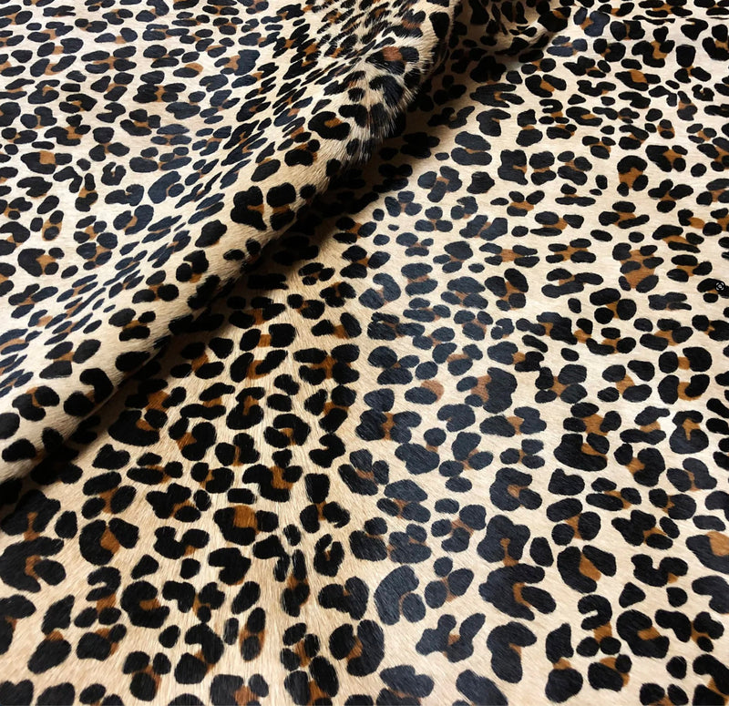 Leopard on Tan Cowhide Rug