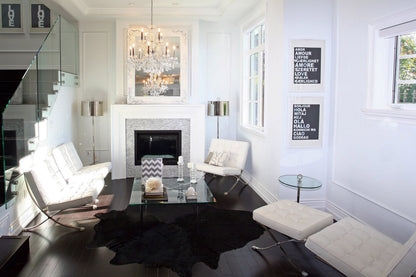 Solid black cowhide rug living room