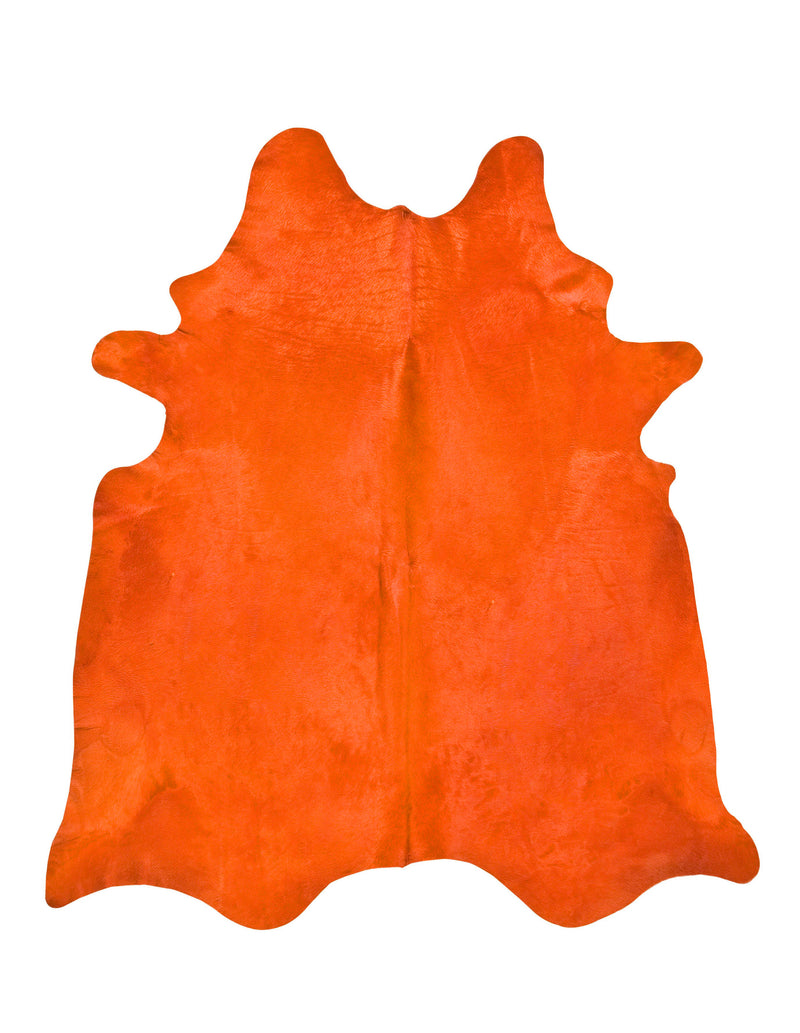 Orange dyed cowhide rug